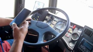 Truck driver using his phone while driving