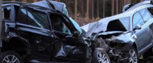 This image shows two cars totaled after a Phoenix car accident