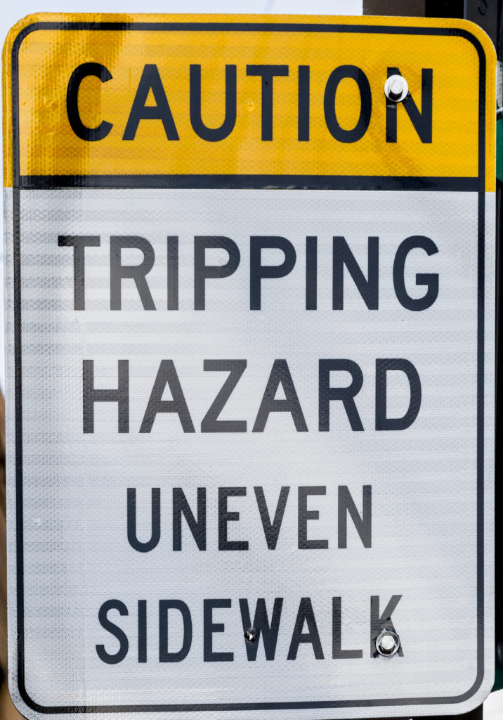 slip and fall on a sidewalk warning 